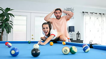 Teen siblings compete in pool game with stakes of monthly chores