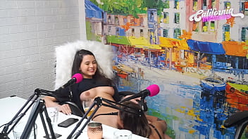 Flavia Oliver gives Natasha Steffens a sensual blowjob during podcast recording